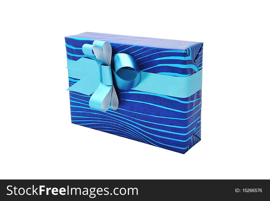 Isolated gift with blue bow on white