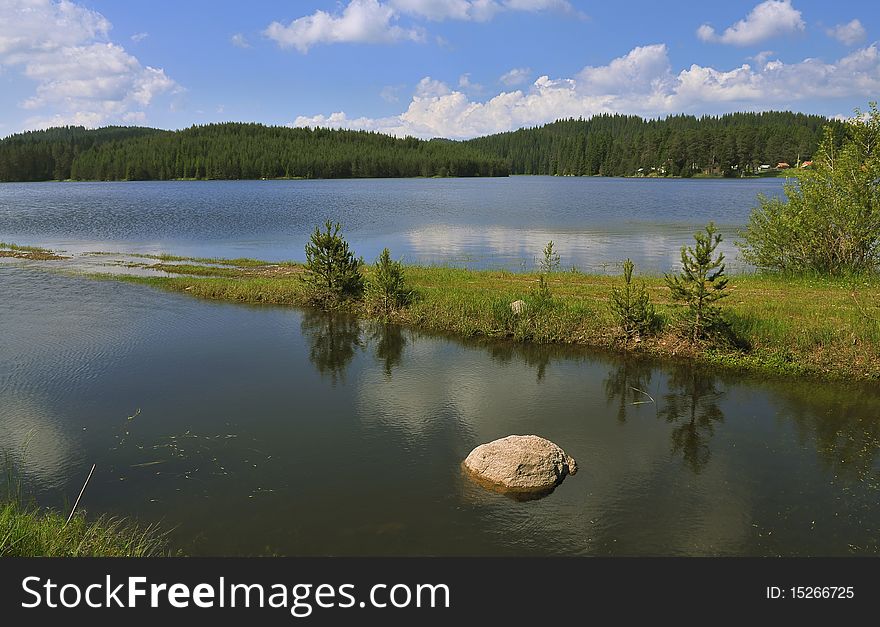 Lake with forest in Rodopi mountine, Bulgaria