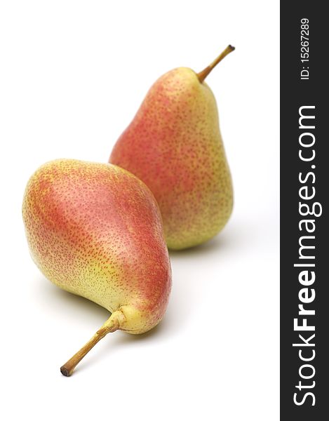 Two ripe yellow-red pears