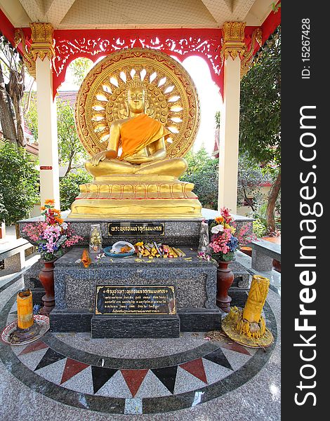 Golden buddha in pavilion, Bang Pra temple, Thailand.