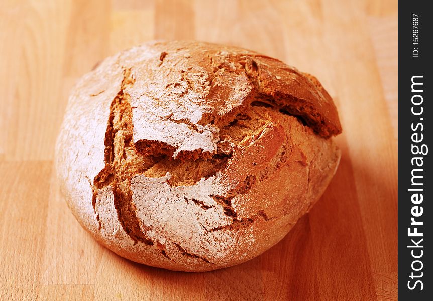 Loaf of fresh crusty bread - closeup. Loaf of fresh crusty bread - closeup