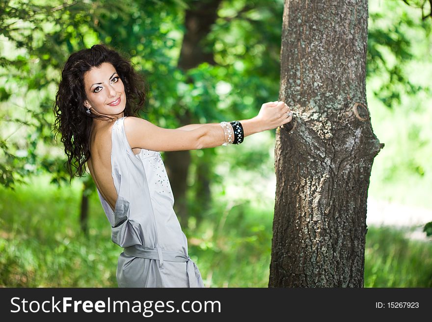 Girl In The Garden With Trees