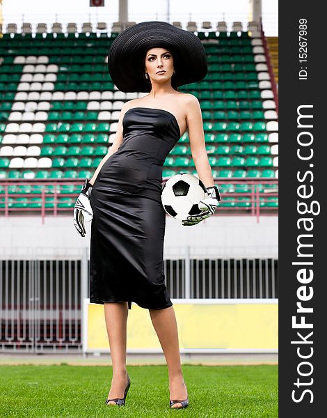 Elegant woman with Football ball