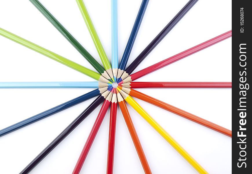 A circle formed by the points of several colored pencils. A circle formed by the points of several colored pencils.