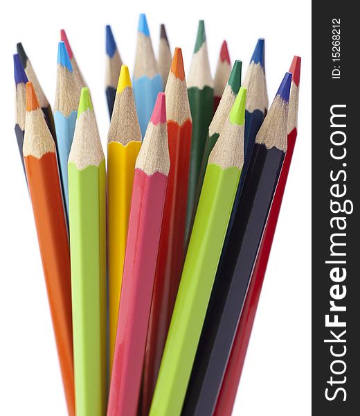 A bunch of color pencils pointing up. A bunch of color pencils pointing up.
