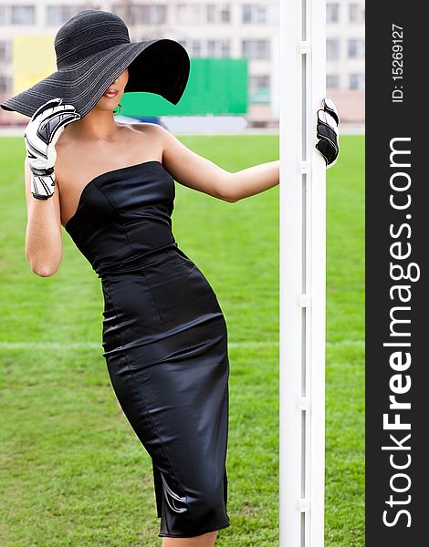 Elegant woman with Football Goalkeeper Glove