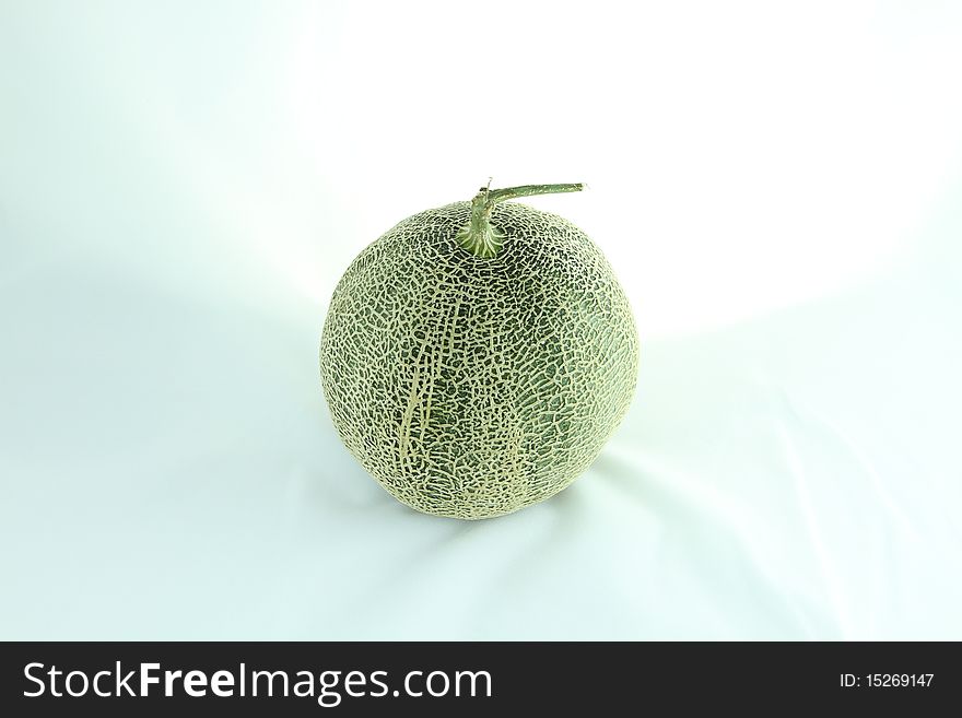 Orange cantaloupe melon isolated on white background