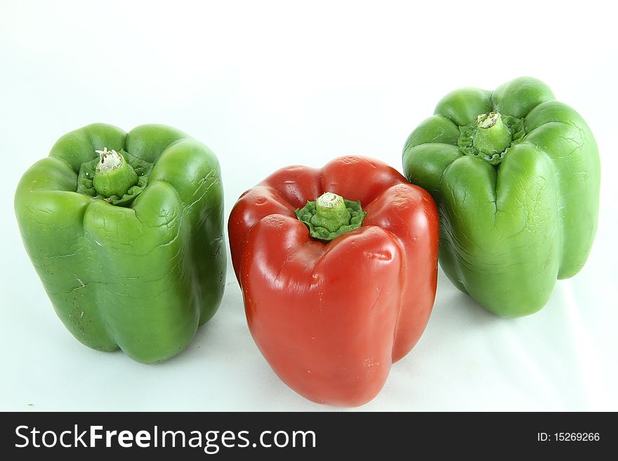 Red bell pepper and Green bell papper isolated on white. Red bell pepper and Green bell papper isolated on white