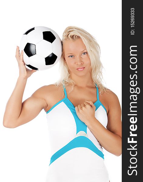 Young blond woman holding a ball. Young blond woman holding a ball
