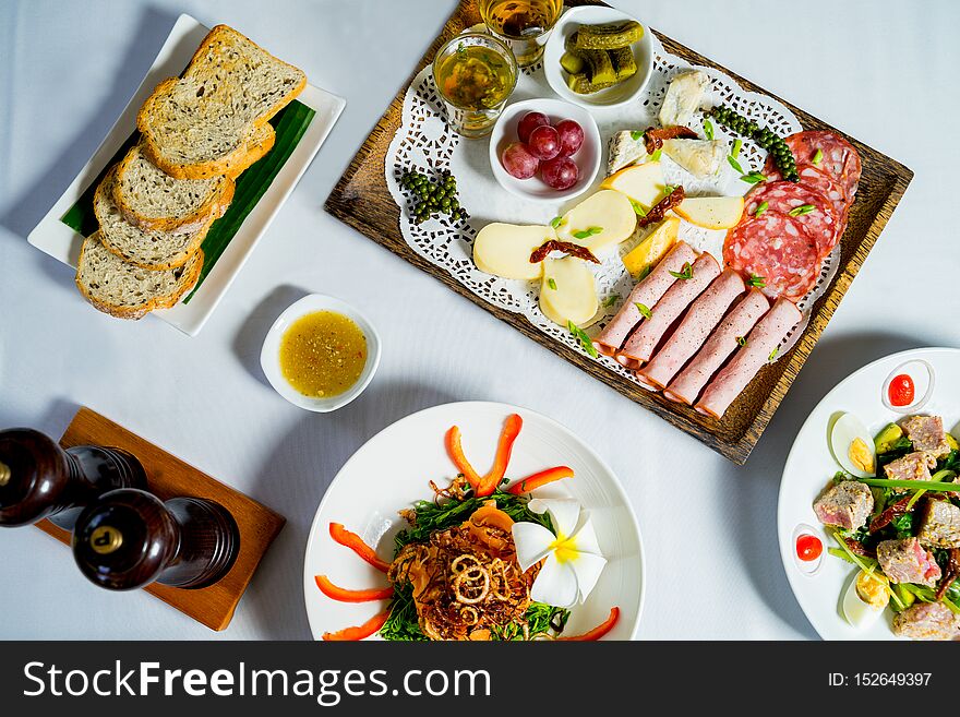 Overhead Of Cheese Platter With Crispy Toasts