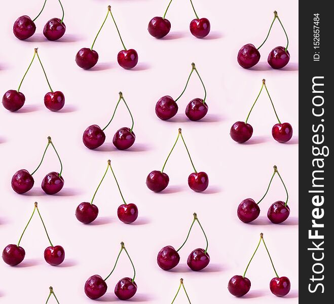 Seamless Cherry Pattern On A Pink Background