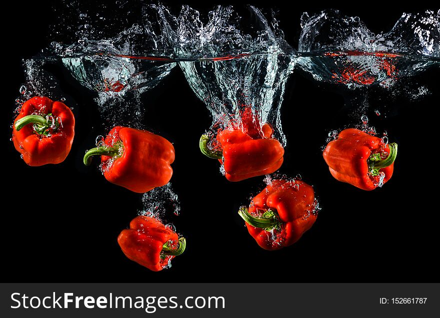 Water droping red bell pepper or paprika