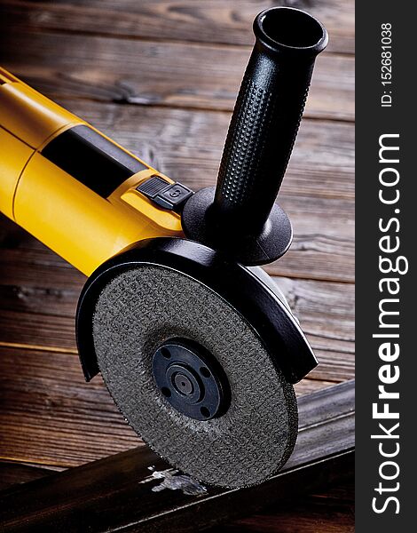 angle grinder for metal on dark background close-up