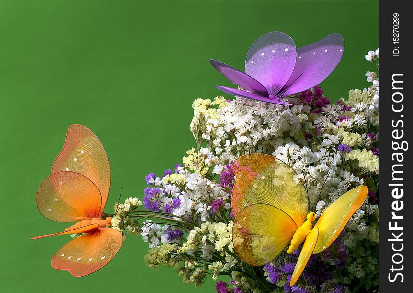 Decorative colourful butterflies on flowers. Decorative colourful butterflies on flowers