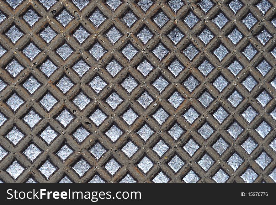 A grunge background texture of shiny metal. A grunge background texture of shiny metal.