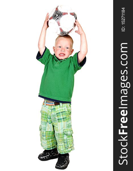 A lovely toddler standing on the floor in the studio holding up a big
soccer ball, on white background. A lovely toddler standing on the floor in the studio holding up a big
soccer ball, on white background.