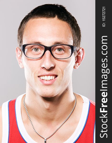 Close up portrait of young man in glasses