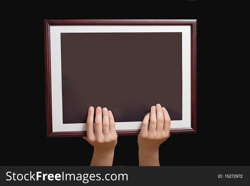 Simple wooden Frame in hands