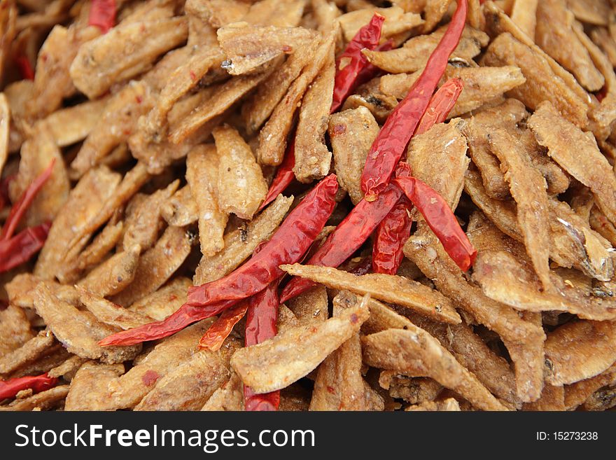 Close shot of spicy dried anchovies in Thai food festival