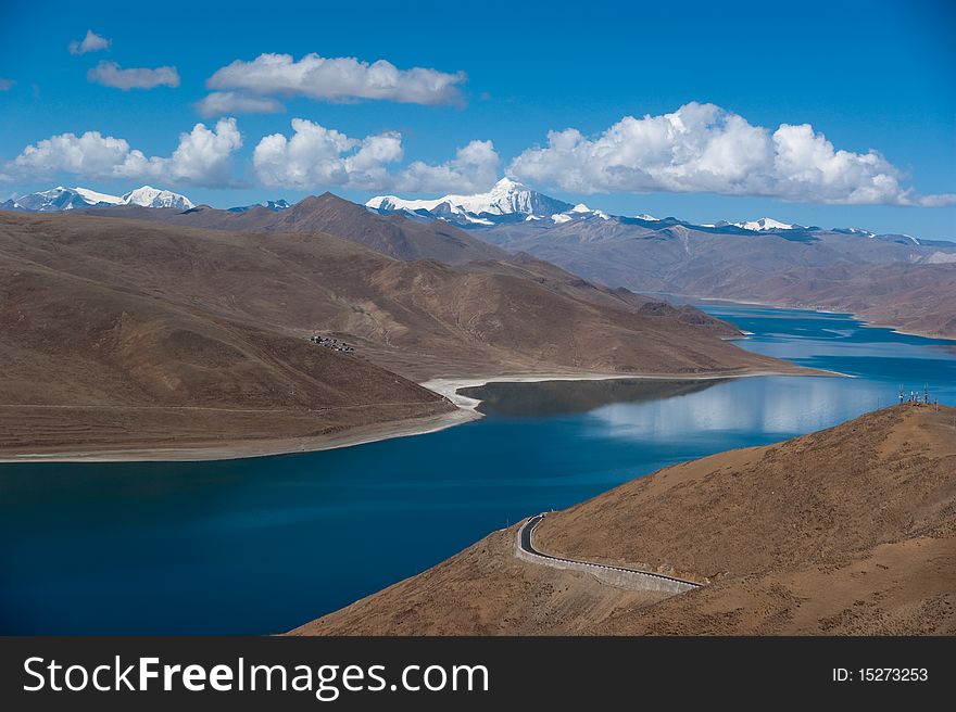 Blue lake with surrounding mountains in great tibet area. Blue lake with surrounding mountains in great tibet area