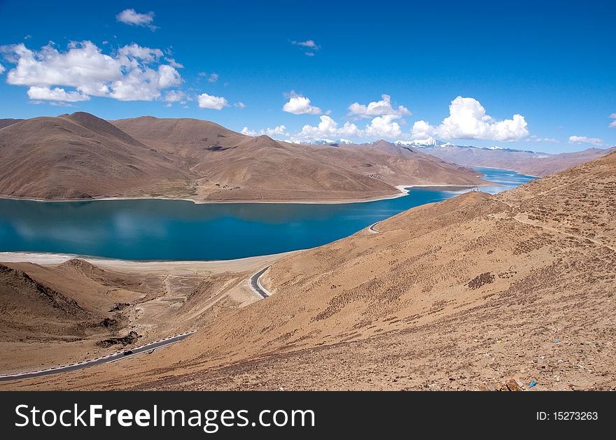 Blue lake with surrounding mountains in great tibet area. Blue lake with surrounding mountains in great tibet area