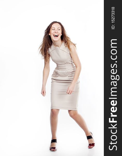 Young girl laughs. Isolated on a white background