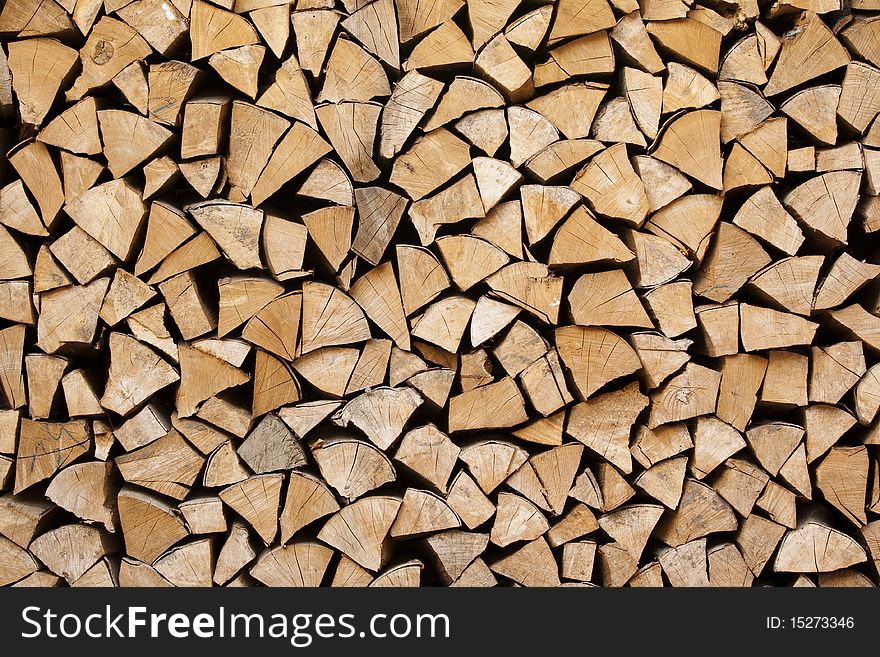 Wood pile stacked for firewood. Wood pile stacked for firewood