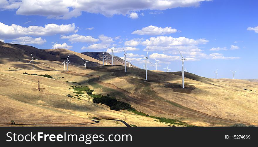 A panorama of wind turbines on a hillside, Washington state. A panorama of wind turbines on a hillside, Washington state.