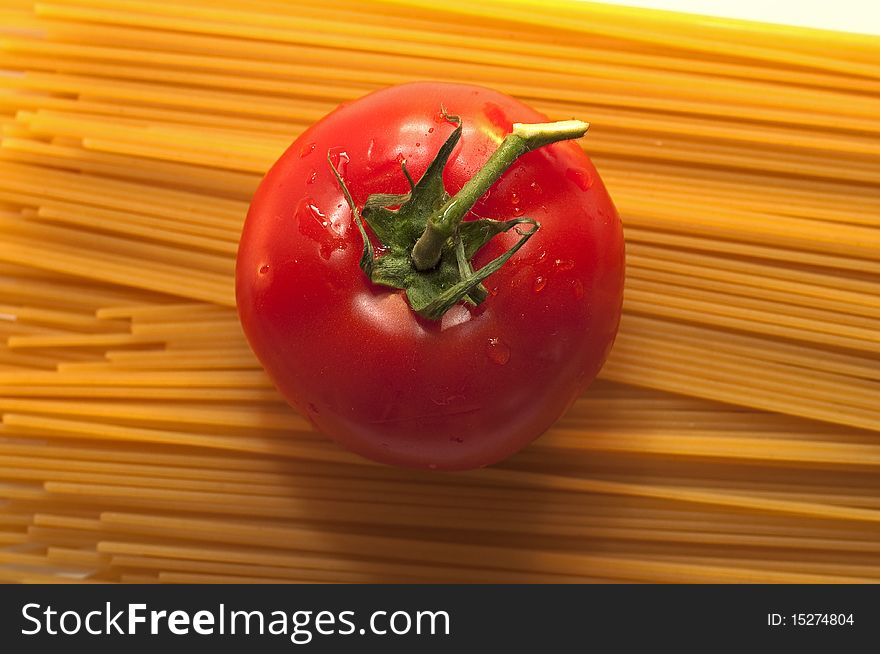 Spaghetti and tomato still life. Spaghetti and tomato still life