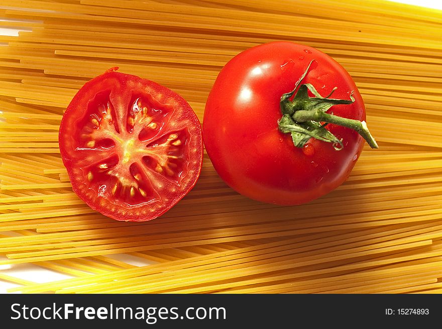 Spaghetti And Sliced Tomato