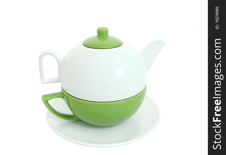 White teapot with green cup