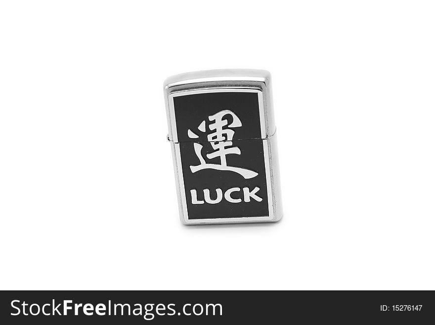 The isolated lighter with an inscription good luck