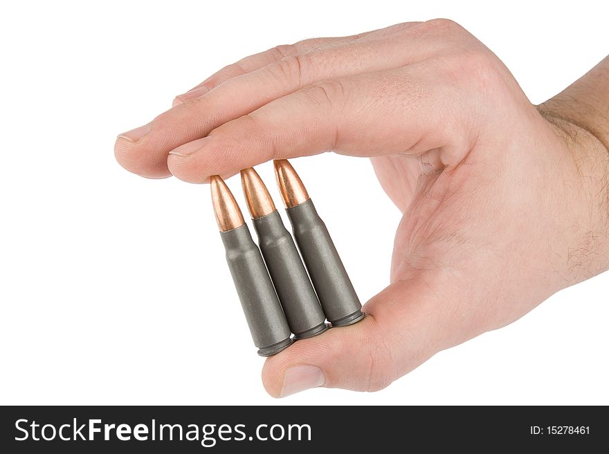 Bullets in hands on a white background. Bullets in hands on a white background.