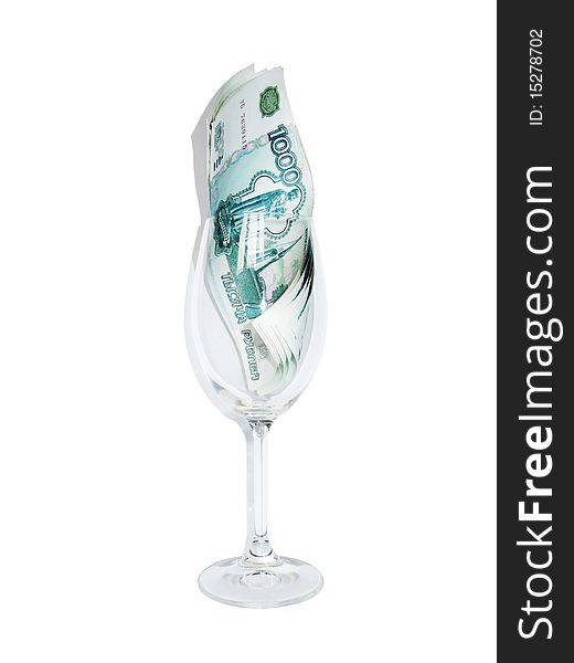 Money in the glass on a white background.