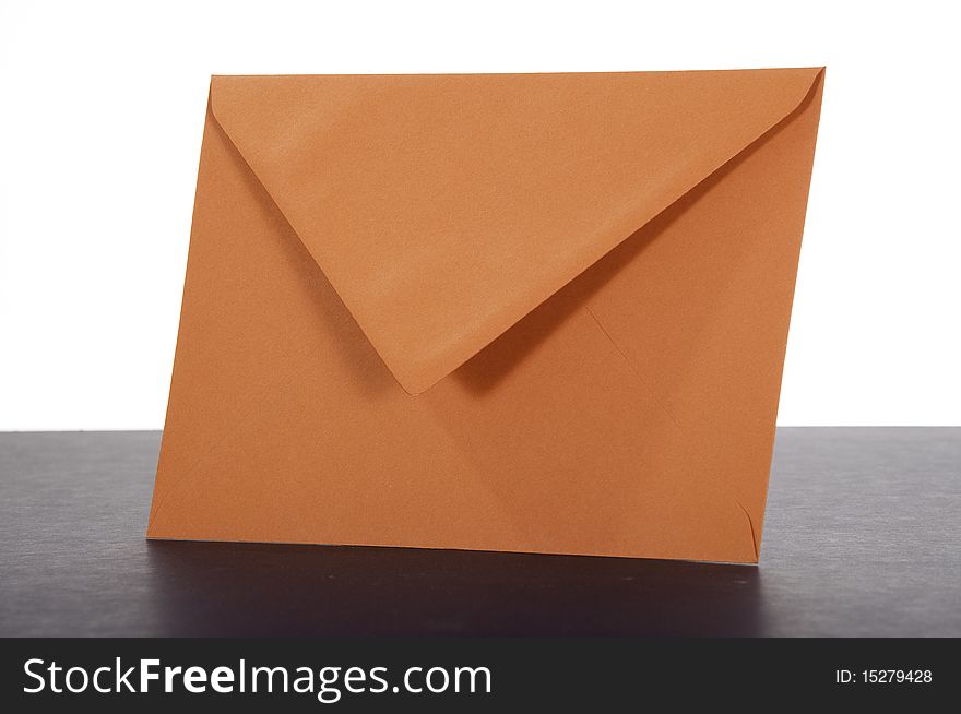 This image shows the envelope of a letter, red. This image shows the envelope of a letter, red