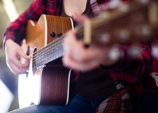 Close-up Girl Holding Guitar Stock Images
