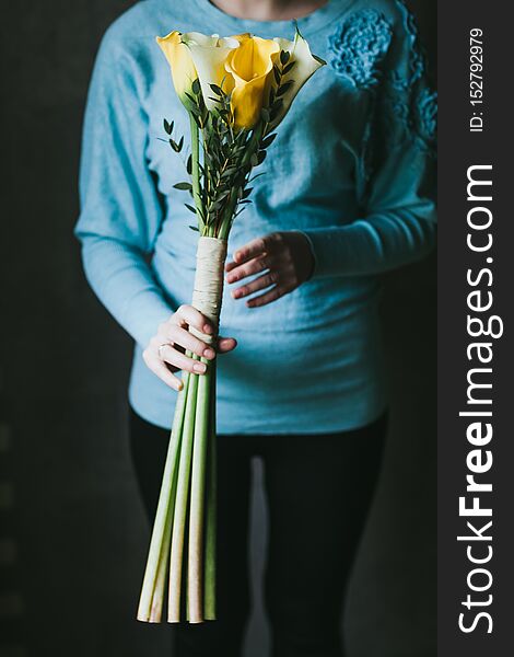 Beautiful bouquet of flowers in the hands of a woman