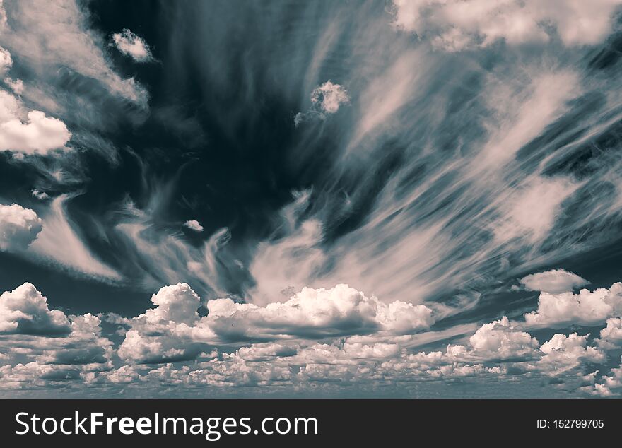 White clouds float in the sky over the Sea coast