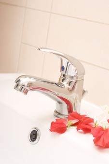 Faucet And Red Flowers Stock Image Faucet And Red Flowers Stock Image