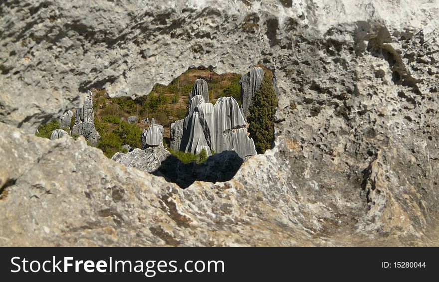 Stone forest rock view through gap. Stone forest rock view through gap