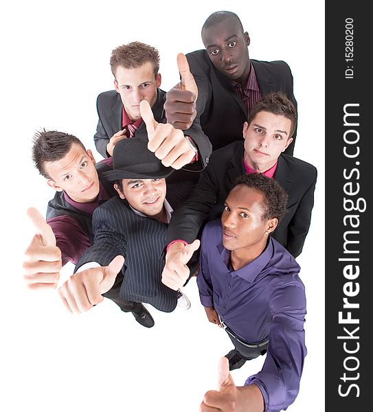 Young interracial group of teenage businessmen giving a thumbs up sign. Fresh trendy models. Young interracial group of teenage businessmen giving a thumbs up sign. Fresh trendy models.