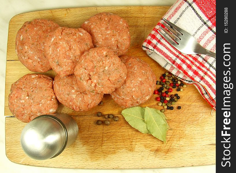 Meat balls on desk preparing for cooking