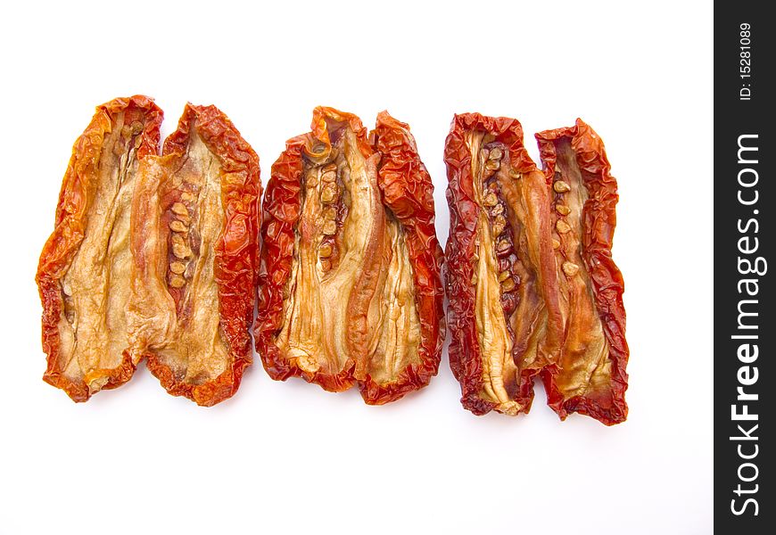 Dried tomatoes isolated on white background