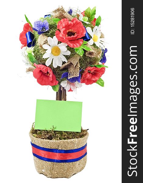 Celebratory decorative tree in a pot with a card