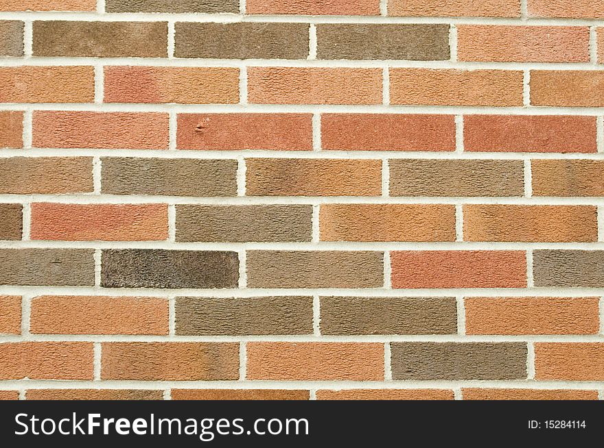 Wall with different colors of textured brick. Wall with different colors of textured brick