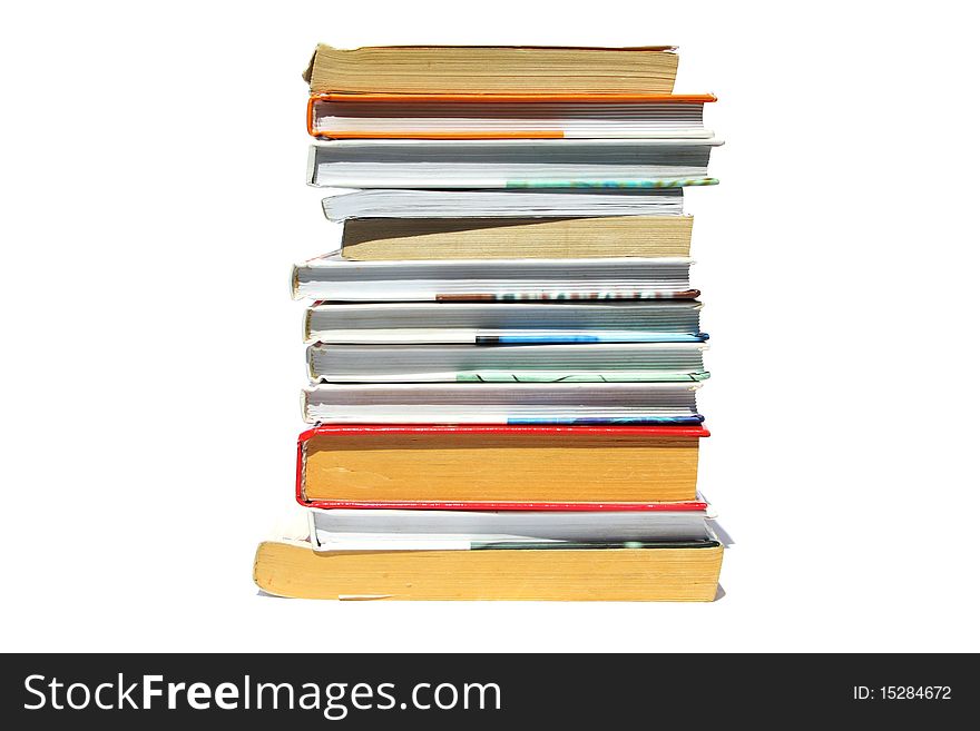 Several books and textbooks on a white background. Several books and textbooks on a white background