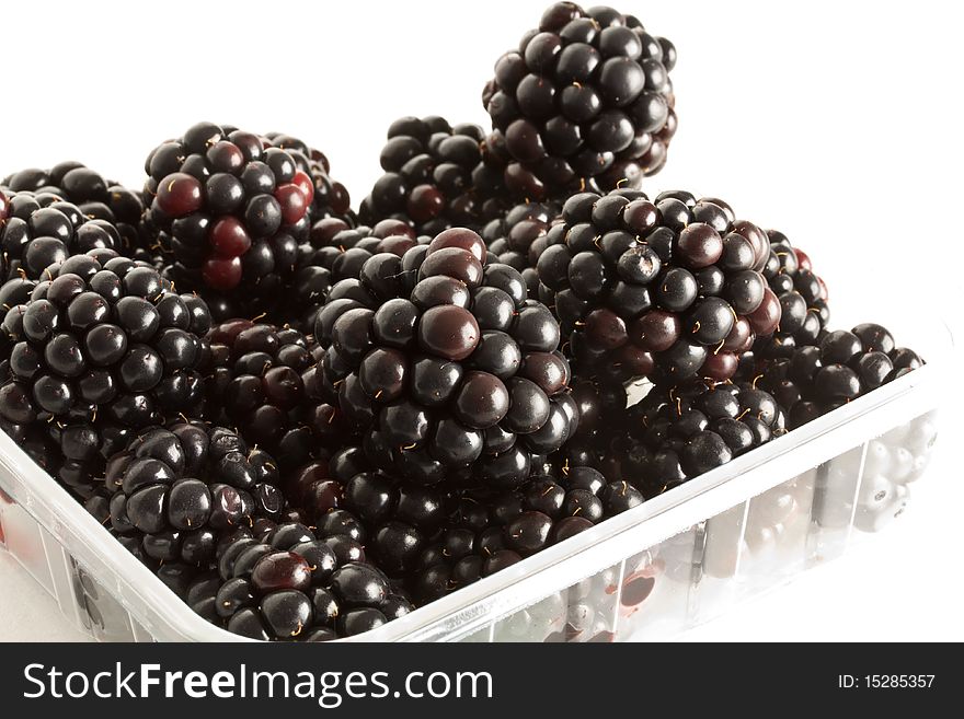 Delicious fresh Blackberries against a white background