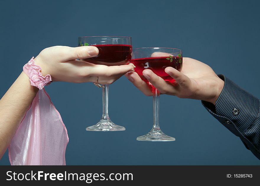 Two glasses,  two hands