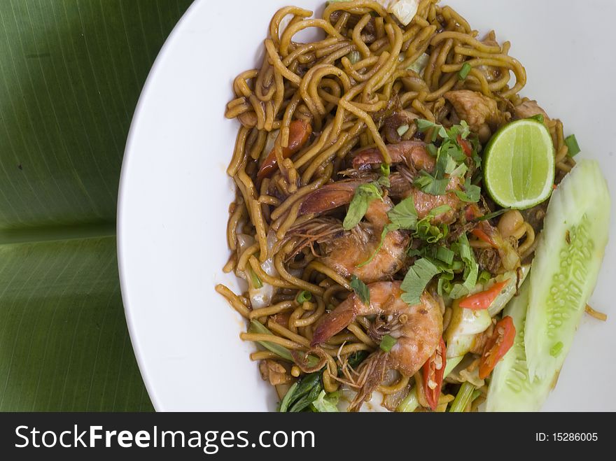 Fried noodles on banana leaves