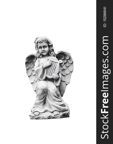 Small statue of an angel playing harp - with clipping path. Small statue of an angel playing harp - with clipping path